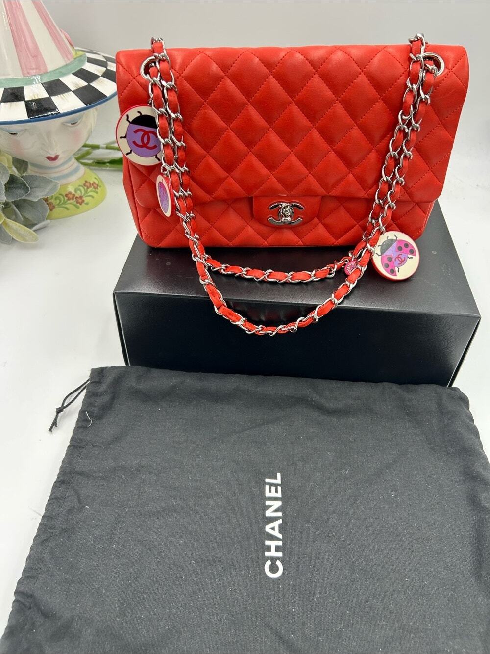 Women's Chanel MATELASSE lambskin shoulder Bag ladybug, and strawberry charms.
